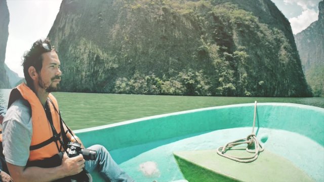 Boat of tourists visiting Ca&ntilde;on del sumidero in Chiapas, Mexico.