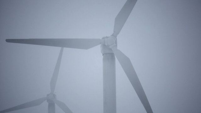 Several wind turbines in winter time