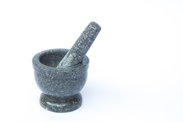 Stone mortar and pestle on white background