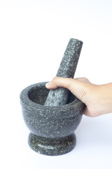 Stone mortar and pestle on white background