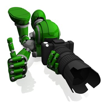 3D Photographer Robot Green Color With DSLR Camera And Black Lens, Thumbs Up