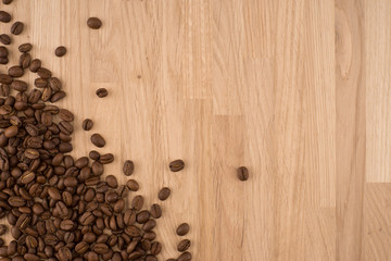 Coffee beans on wood background
