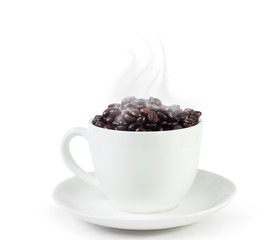 Coffee beans and coffee mug on white background