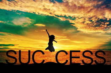 Silhouette young woman jumping on the sea and Success text. Success concept