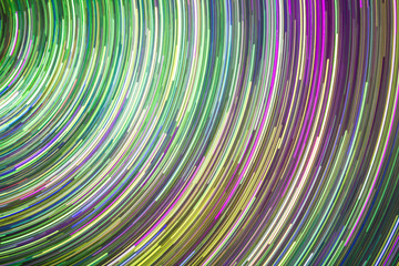 Long exposure colorful round neon lights pattern.