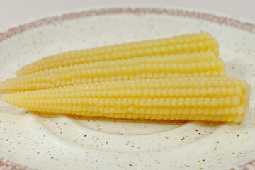 Small loaded corns on plate
