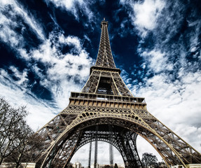 Fototapeta na wymiar Eiffel tower at winter. Vintage colored picture. Business and travel concept