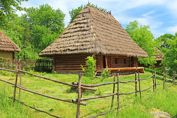 Fototapeta na wymiar Old wooden house in museum of Folk Architecture in Uzhhorod, Ukraine