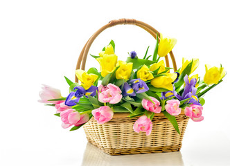 Fototapeta na wymiar Beautiful bouquet of bright flowers in basket . Isolated on whit