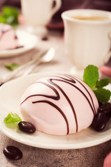 Mousse cakes covered with pink glaze 