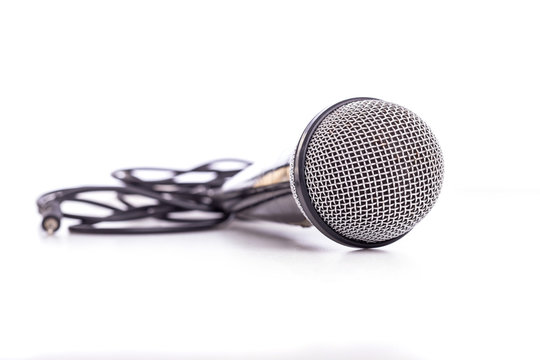 Close up old microphone isolated on white