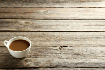 Cup of coffee on a grey wooden table