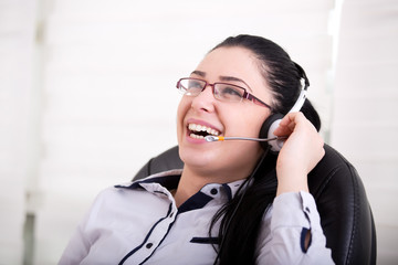 Girl with headset laughing