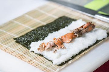 the process of Cooking sushi, shallow DOF