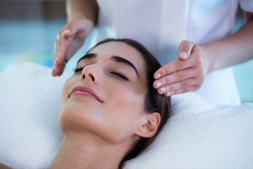 Fototapeta na wymiar Woman receiving massage from masseur