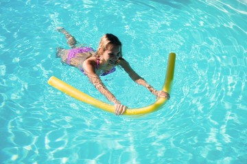 Woman receiving ear candle treatment