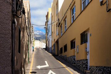 Summer cityscape on tropical island Tenerife, Canary in Spain. Street of old town Guia de Isora.