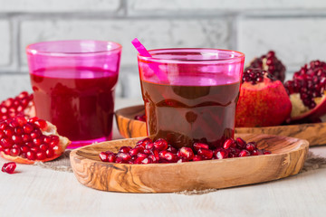 pomegranate juice  and ripe red pomegranate
