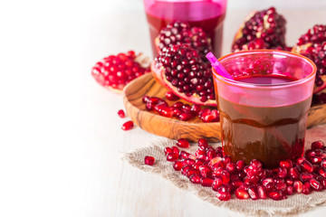 pomegranate juice  and ripe red pomegranate