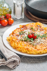 pasta casserole with eggs, sun-dried tomato and cheese