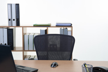 monitor on a desk in a modern office with nobody