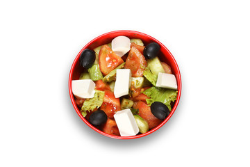 Греческий салат на белом фоне