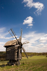 Fototapeta na wymiar Antique wooden windmill