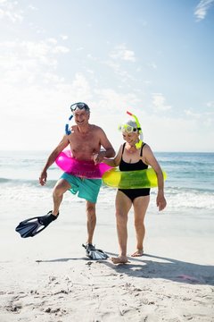 Senior couple enjoying on beach