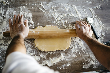 Making ravioli on a wooden table and tools - 106677718
