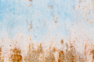 Old blue cracked paint on metal background