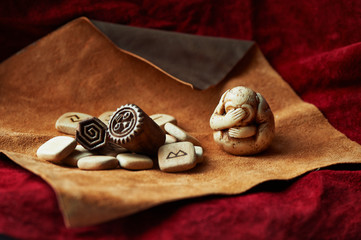Three wise monkeys or Three Mystic Apes sacred ancient icon, brown background 