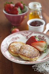 Pancakes with berries and ice cream