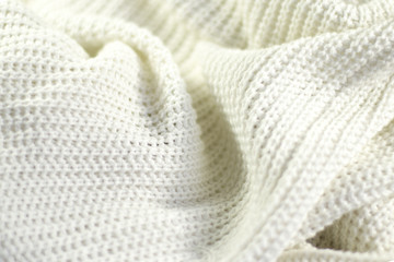 Fragment of a wrinkled knitted white