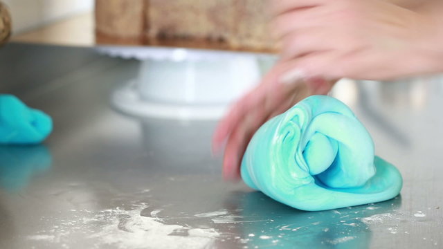 Making decoration for dessert from sugar mastic