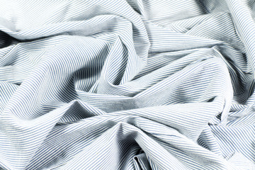 blue and white fabric with stripes