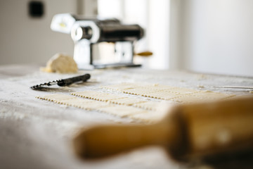 Making ravioli on a wooden table and tools