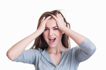 Young woman with a headache holding head