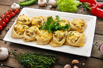 Restaurant food top view, creamy mushroom crepes.