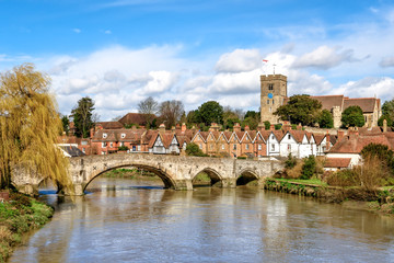 Fototapeta na wymiar Rural Kent. View of Aylesford village in Kent, England with medieval bridge and church.