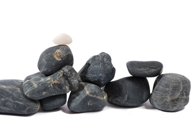 Heap of black stones isolated on white