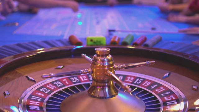 Spinning Roulette wheel and putting bets