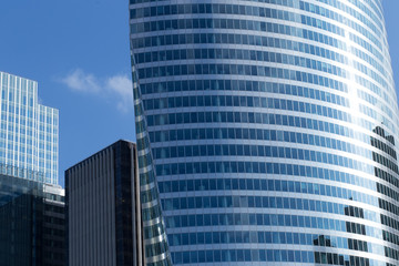 Obraz na płótnie Canvas Skyscraper with glass facade. Modern building. Concepts of economics, financial, business future. Copy space for text.
