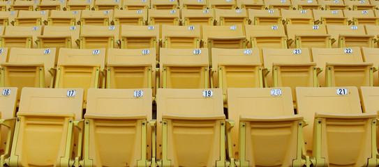 Fototapeta premium Yellow seats on the grandstand