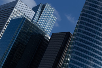 Obraz premium Skyscraper with glass facade. Modern building. Concepts of economics, financial, business future. Copy space for text.