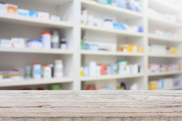 pharmacy product display counter with drugstore shelves