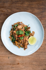 Asian stir fried flat rice noodles. Pad se ew with chicken