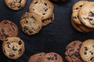 Cookies with Chocolate chip  on dark wooden background. Top view.