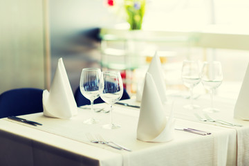 close up of table setting with glasses and cutlery