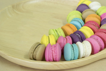 macaroons in a wooden tray. with space for text