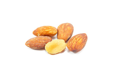 Selective focus almonds on white background.